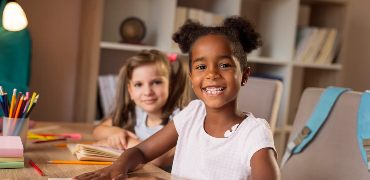 Student smiling at the camera